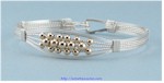 Silver Bangle Bracelet with Gold Beads