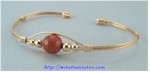 Single Goldstone Bead Cuff Bracelet