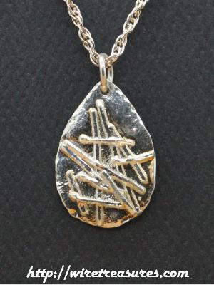 Sticks-and-Stones Silver Pendant