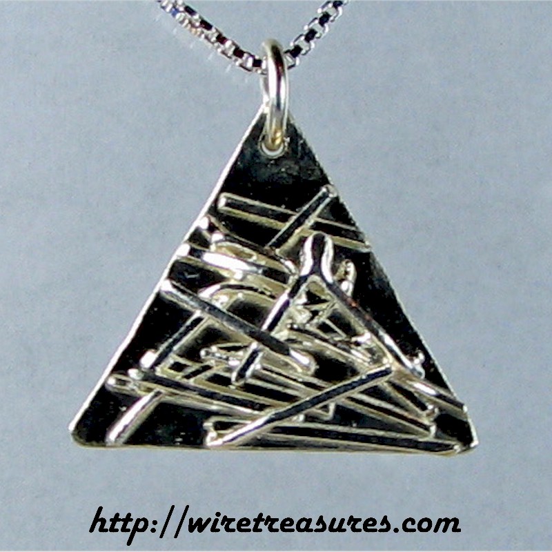 Sticks and Stones Silver Pendant